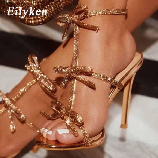Eilyken Design Style Peep Toe Buckle Strap Woman Sandals Fashion Crystal Thin High Heels Stripper Party Ladies Shoes